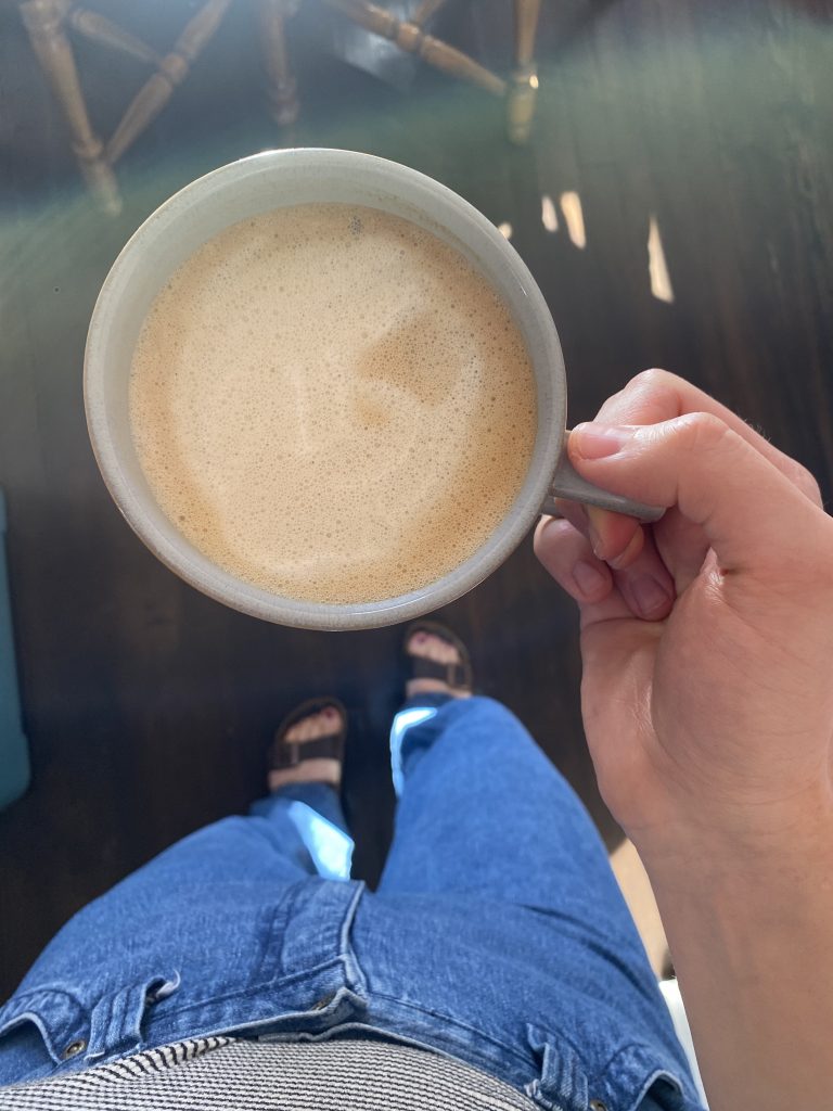 A picture of the lavender latte and my legs and feet